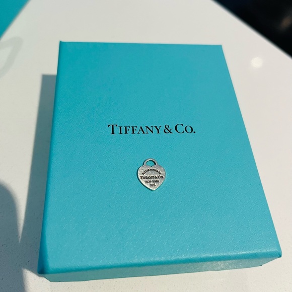 Tiffany & Co. Jewelry - REDUCED!! Tiffany and Co small Charm/pendant.